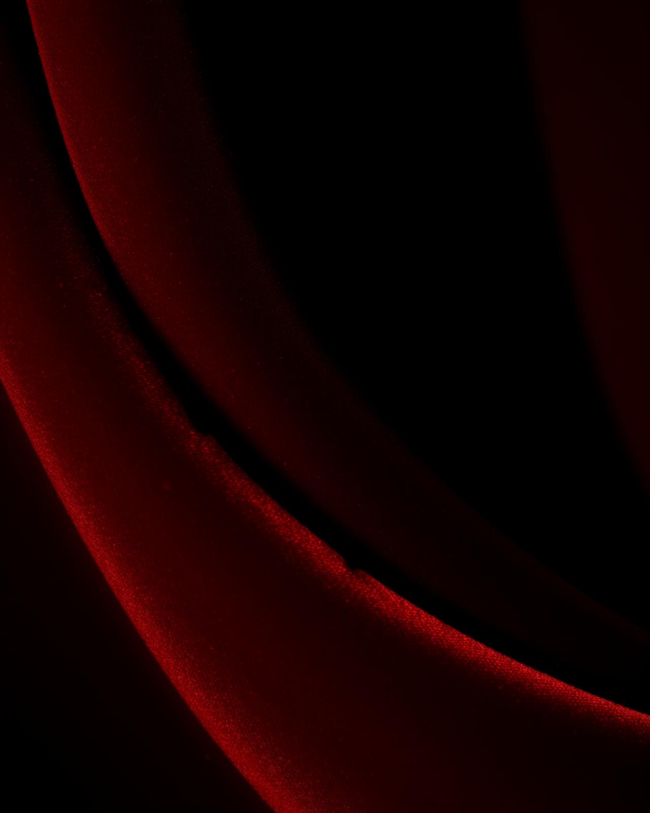 Folds of deep red velvet